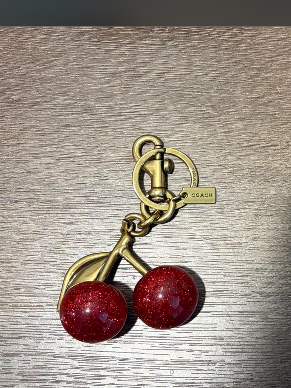 Coach Gold-Tone Cherry Keyring with Red Glitter Cherries